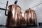 interior of modern brewery with copper tanks for beer production