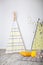 Interior of modern children`s room with yellow teepee. Children wigwam home. Interior of stylish children`s room with toys. scandi