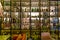 Interior of a modern cozy swedish restaurant. Various bottles with alcohol on the shelves