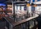 Interior of modern european beer bar pub with old vintage wooden furniture and style.