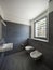 Interior of a modern house, gray bathroom