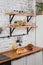 Interior of modern kitchen white brick wall zero waste concept glass jars mesh reuse bag