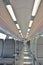 Interior of a modern train, lights, chairs