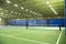 Interior of modern trendy indoor tennis court. Minsk, Belarus- May 25, 2022