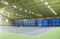 Interior of modern trendy indoor tennis court. Minsk, Belarus- May 25, 2022