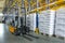 Interior of a modern warehouse with forklifts. Pallet stacker truck equipment at warehouse. Forklift loader