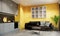 Interior of modern yellow room with furniture. contemporary apartment style. the room has balcony to see outside view