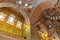 Interior of the mosque with floral ornaments and Arabic ligature