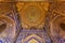 The interior of the mosque in the Tilla-Kari madrasah on the Registan square, the dome, the ceiling. Samarkand,