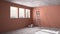 Interior of a new house under construction, home renovation, brick walls, concrete flooring, architecture engineering concept