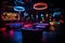 Interior of a night club with neon lights. Nightlife concept, colorful interior of bright and beautiful night club with dark seats