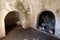 Interior of old abandoned Trulli house with multiple conical roofs in the area of Cisternino / Alberobello in Puglia Italy