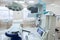 Interior of operating room in modern clinic. Hospital details - Modern surgery room with technology and lamps.