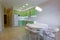 Interior photography large studio room with green modern kitchen