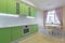 Interior photography large studio room with green modern kitchen