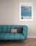 Interior poster mockup in minimal living room with sofa. Panoramic view, surreal perspectives on white wall with herringbone