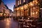 interior of a romantic cozy cafe in an old style with evening lighting, a piano, a fireplace and a view of the night city street,