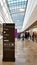 Interior of shopping mall `Val dâ€™ Europe` transparent roof - many shops, cafes and restaurants, Paris