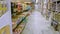 Interior shot of city supermarket, Various brand in packaging for sale on supermarket stand