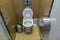 Interior of simple restroom toilet, view from above. White ceramic toilet lavatory ceramic seat on copy space background of light