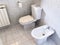 Interior of simple white toilet room