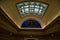 Interior skylight of the oklahoma state capitol with an arched mural
