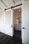 Interior sliding barn doors into bathroom