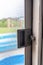 Interior sliding screen door hardware and flip latch