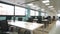 Interior of spacious office with computers on tables