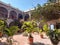 Interior square courtyard with trees, flowers, arches Convent (Convento) of Santa Cruz de la Popa Cartagena