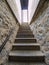 Interior of steep staircase leading to castle underground