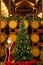 Interior stock photo of Christmas tree set against wine barrels