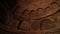 Interior of  stone dome ceiling of grotto with arched niches in grotto.