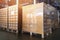 Interior of Storage Warehouse. Stacked of Package Boxes Wrapped Plastic Flim on pallet rack.