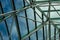 Interior structural support for a large greenhouse enclosure, blue sky beyond