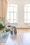 Interior of stylish loft. spacious apartment with large windows, parquet on the floor and light walls. closeup view of shelving