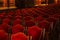 Interior theater art. Audience with empty soft armchairs of Opera and Ballet Theater is waiting for audience. Empty interior of