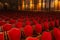 Interior theater art. Audience with empty soft armchairs of Opera and Ballet Theater is waiting for audience. Empty interior of