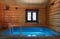 The interior of the traditional bath of wood is a pool and a hanging bucket.