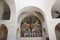 Interior of trullo church with archs and windows, Alberobello, Italy