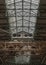 Interior of Turbine Hall B with an old gantry crane suspending an art installation at New Battersea Power Station