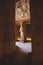 Interior View with an Ancient Egyptian Statues of Ramesses linked to the god Osiris in the Great Temple at Abu Simbel