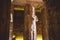 Interior View with an Ancient Egyptian Statues of Ramesses linked to the god Osiris in the Great Temple at Abu Simbel