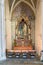 Interior view of the Cathedral of Saint Corentin, Quimper in Brittany with detail view of chapel and statue