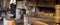 Interior view of an old iron forge and blacksmith shop with anvil and fire and other equipment