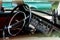 Interior view of old vintage car. View on dashboard of classic car