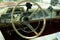 Interior view of old vintage car. View on dashboard of classic car