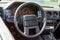 Interior view of old vintage car. View on dashboard of classic car