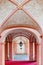Interior view of a pink painted Abbey