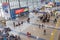 Interior view of Vladivostok International Airport. Many passengers waiting for boarding, cafe and stores